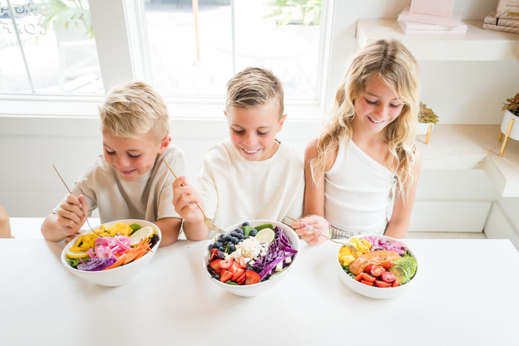 Austin commercial brand photography with families at Real and Raw 30A
