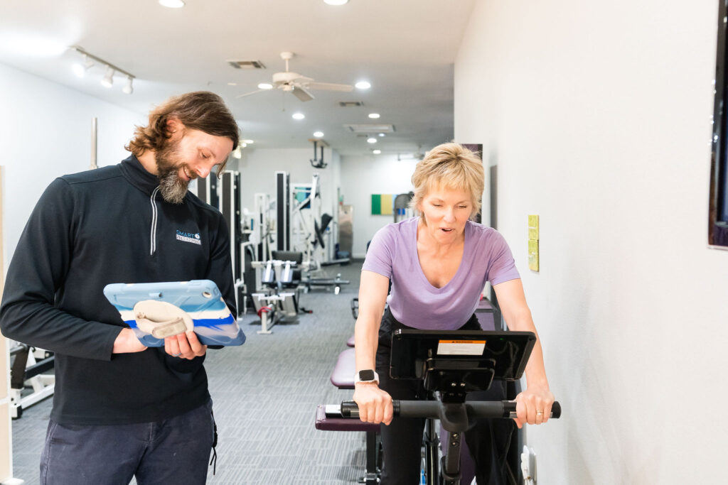 Austin gym owner working with client during brand photoshoot