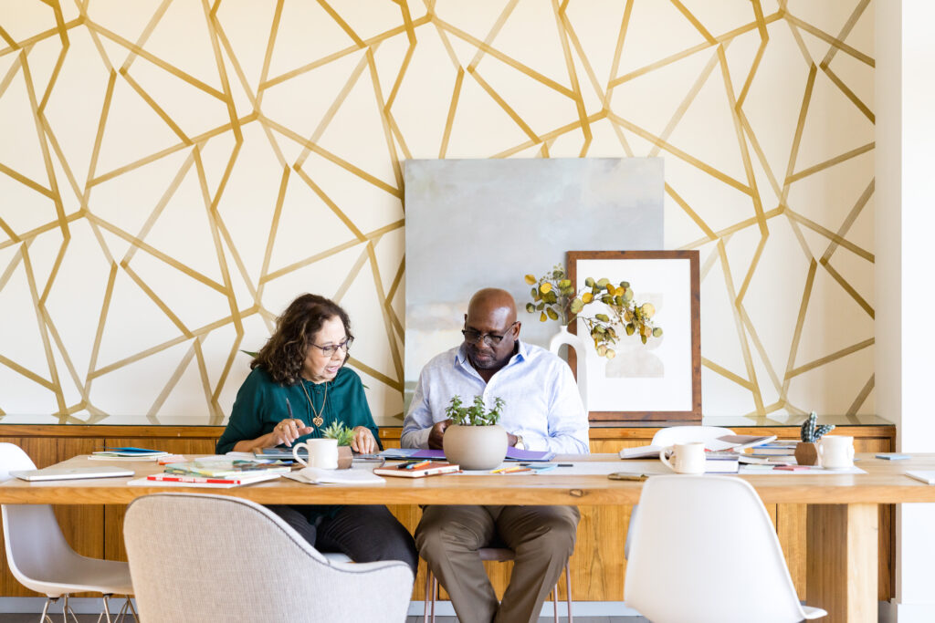 Behind the scenes of structured brand photography session for editorial team