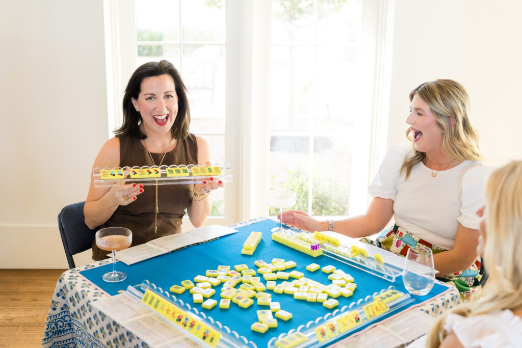 mahjong tiles and racks styled for Mahj Social Club event