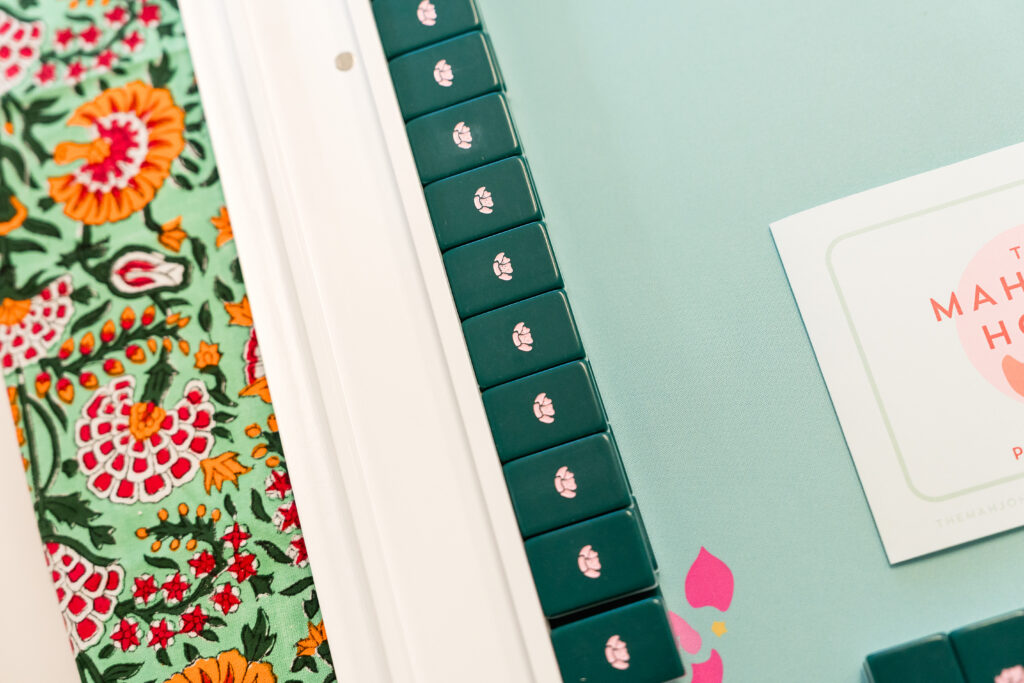 mahjong tiles and racks during a Mahj House Austin game night