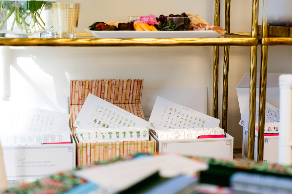 mahjong tiles and hands during a lifestyle brand photography session