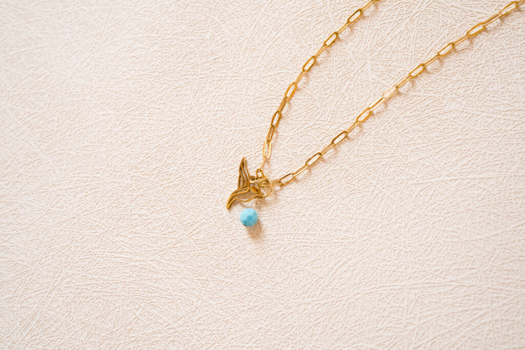 austin jewelry photography gold necklace flatlay minimal styling