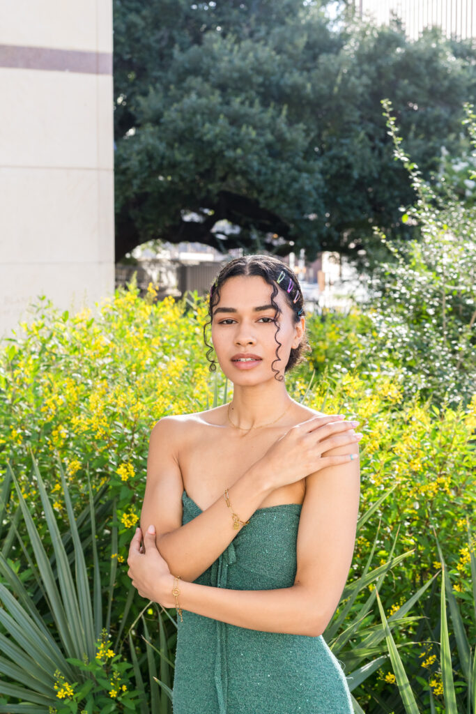 austin jewelry photography model wearing layered gold necklaces