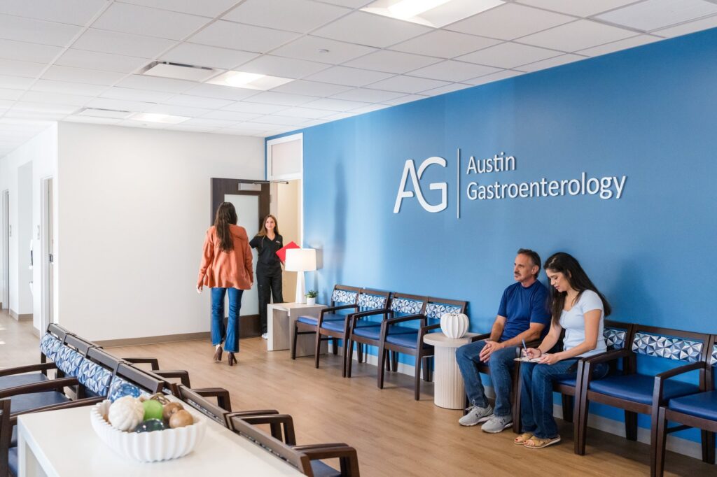 Austin healthcare photographer capturing physician greeting patient in clinic