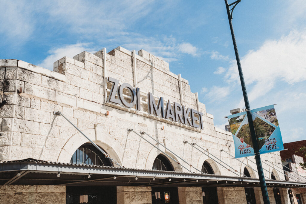 the outside signage for Zoi Market